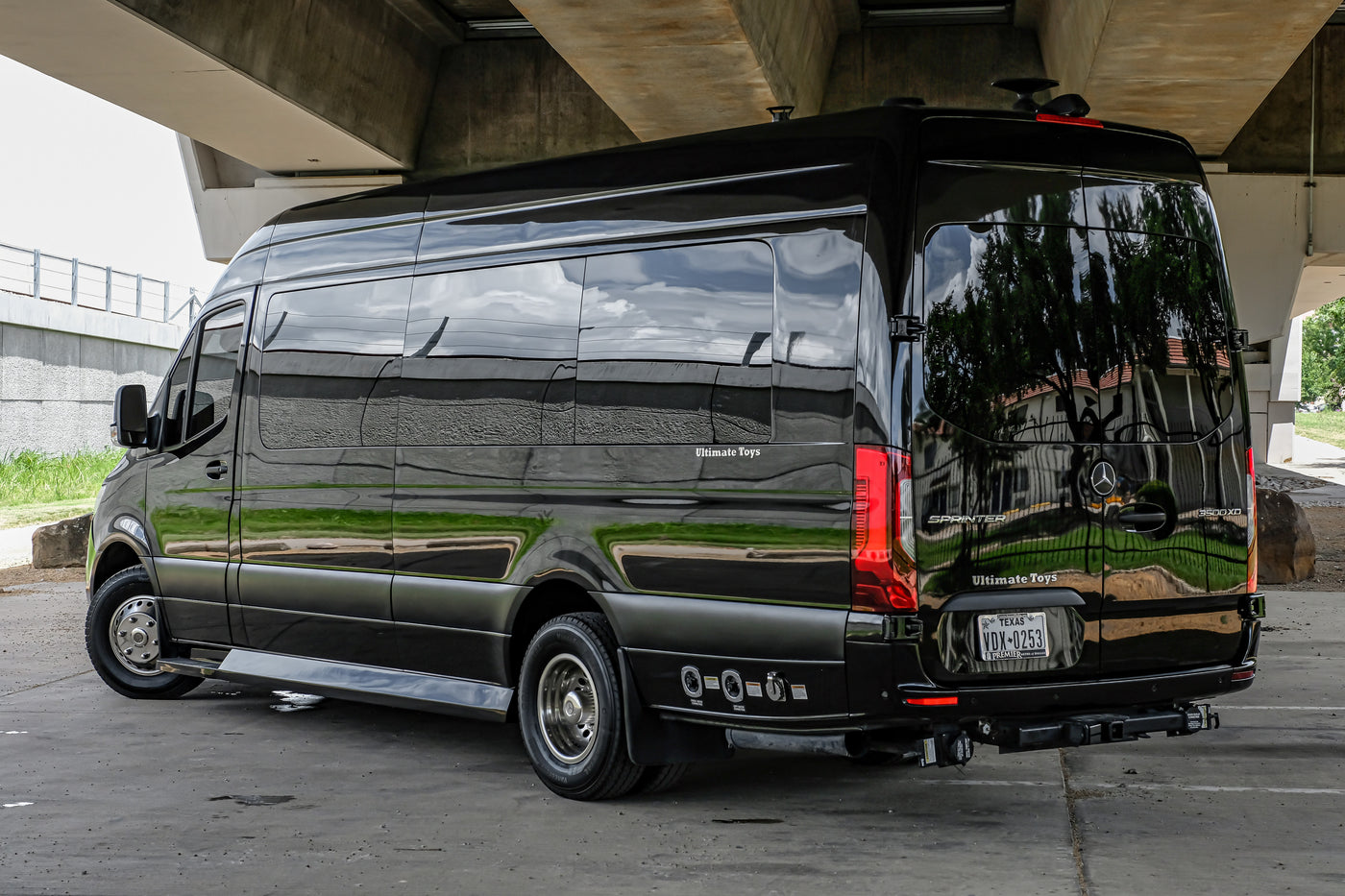 Experience premium travel with this black Mercedes Sprinter rv rental. A luxurious custom conversion van, 'Ultimate Toys' edition. — photo 8