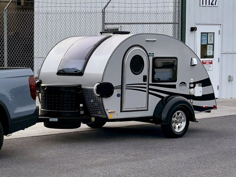A sleek gray T@G teardrop RV rental — photo 1