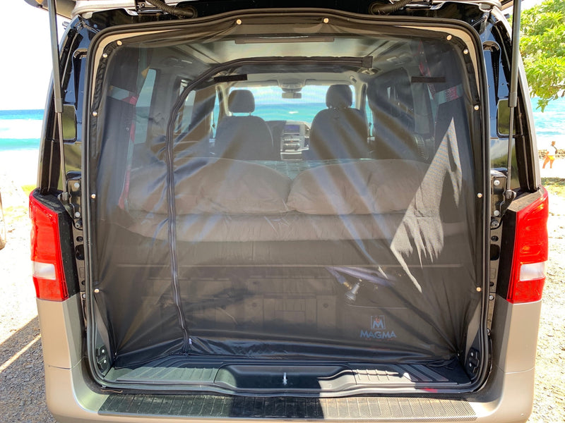  and infotainment screen.|RV rental: Comfortable rear bench seat with seatbelts and beach view. Features a fan — photo 11