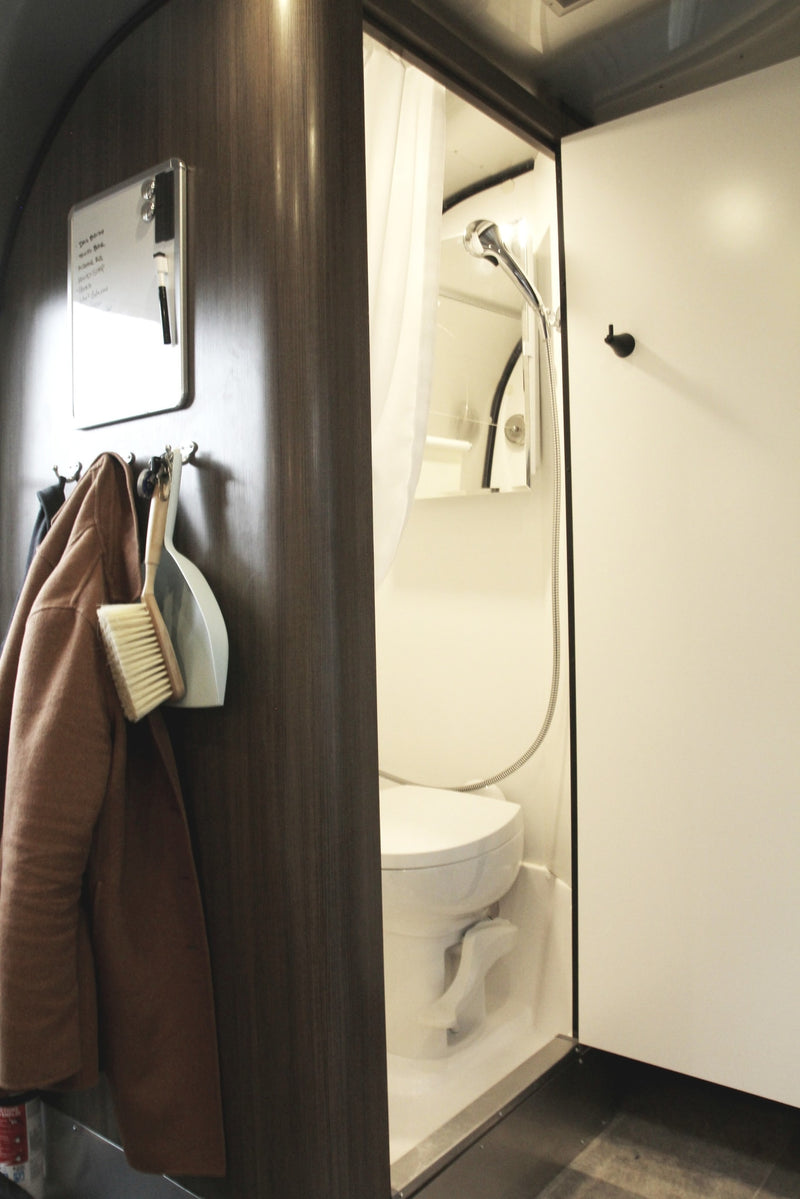  enjoying the window view.|Inside an RV rental: a modern bedroom with a bed — photo 12
