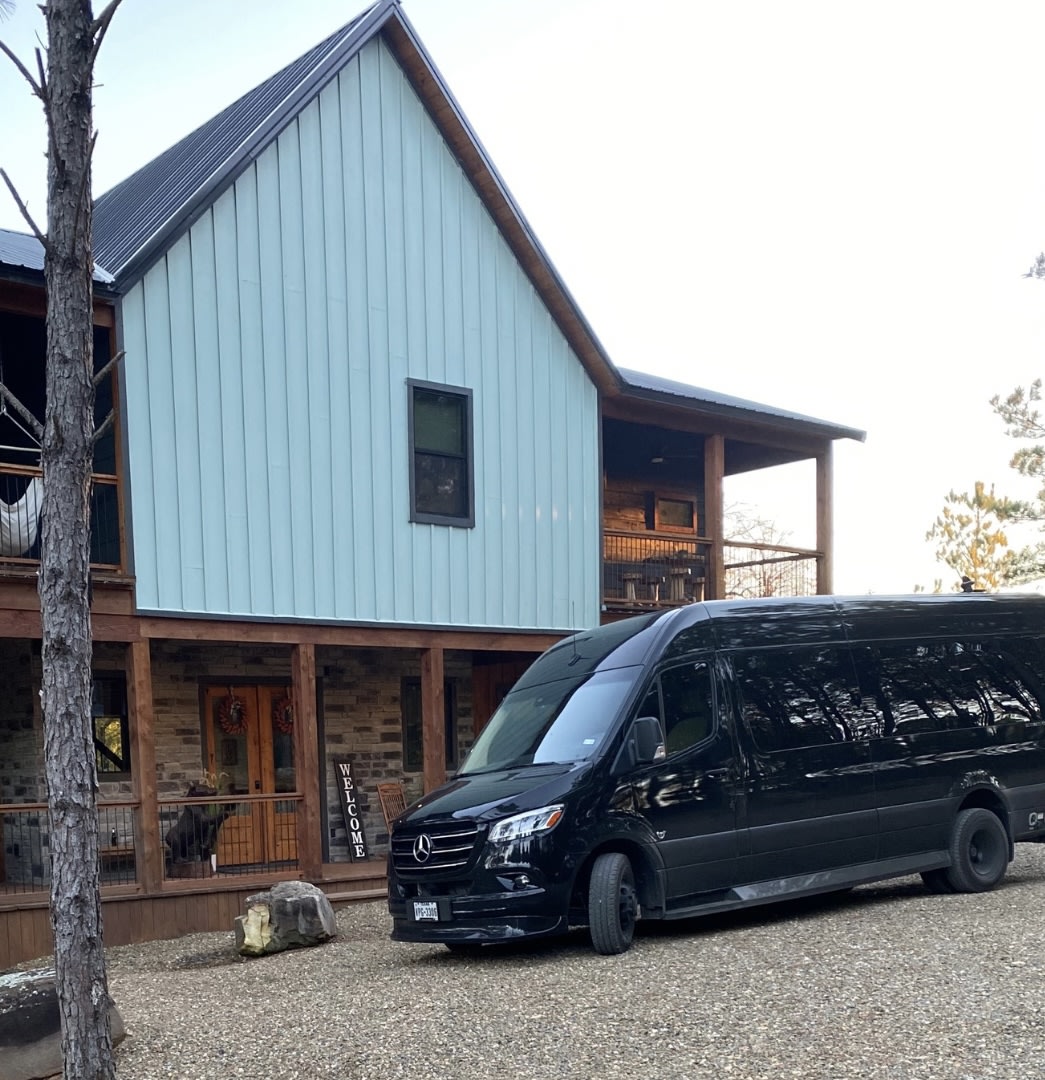  a black Mercedes Sprinter van — photo 1