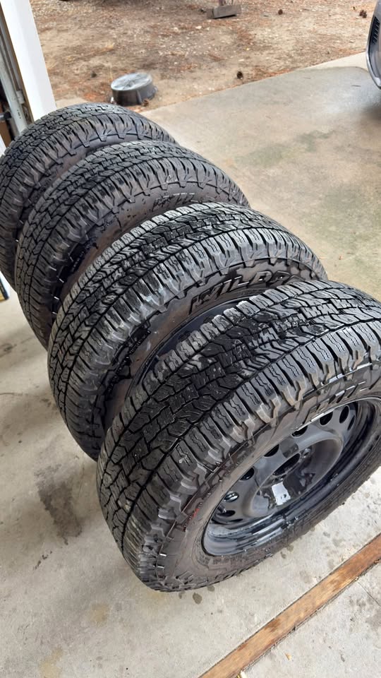 $550 OBO. Falken Wildpeak A/T Trail Tires + Steel Wheels Set of 4, 215/70R16 in Boise, ID (photo 1) — photo 1
