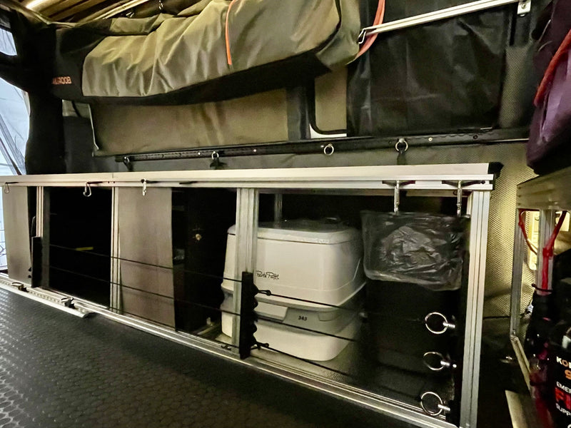  and a unique slatted ceiling.|Spacious camper van interior for your next rv rental adventure. Features bed platform — photo 12