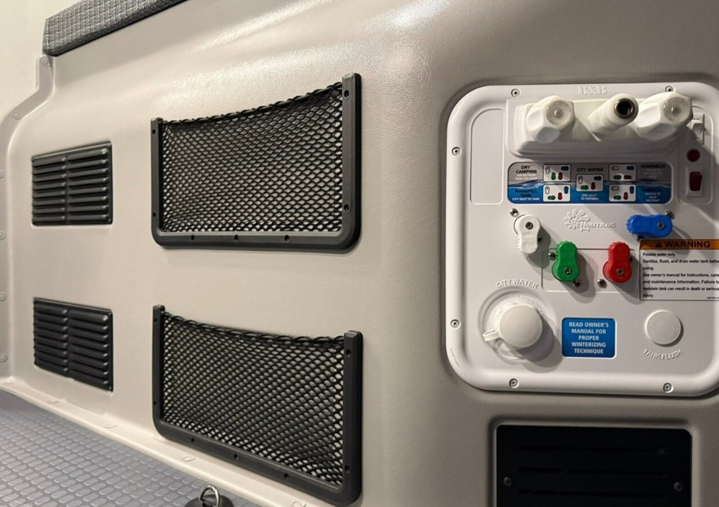  offering beautiful nature views for your trip.|Inside a modern RV rental: front cabin with swiveling seats — photo 8