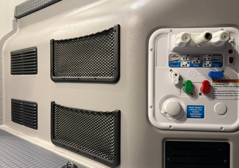  offering beautiful nature views for your trip.|Inside a modern RV rental: front cabin with swiveling seats — photo 8