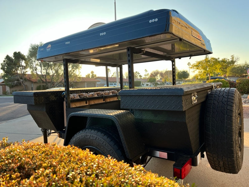 Rugged black adventure trailer with a rooftop tent & storage boxes, perfect for your next RV rental adventure. — photo 14