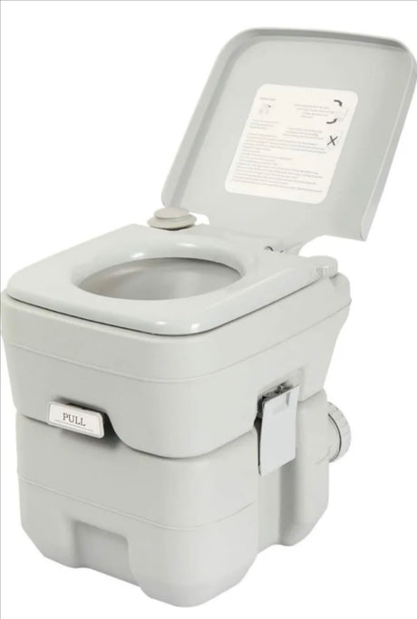 Light gray portable toilet, essential for RV rental adventures. Provides convenient, off-grid sanitation.