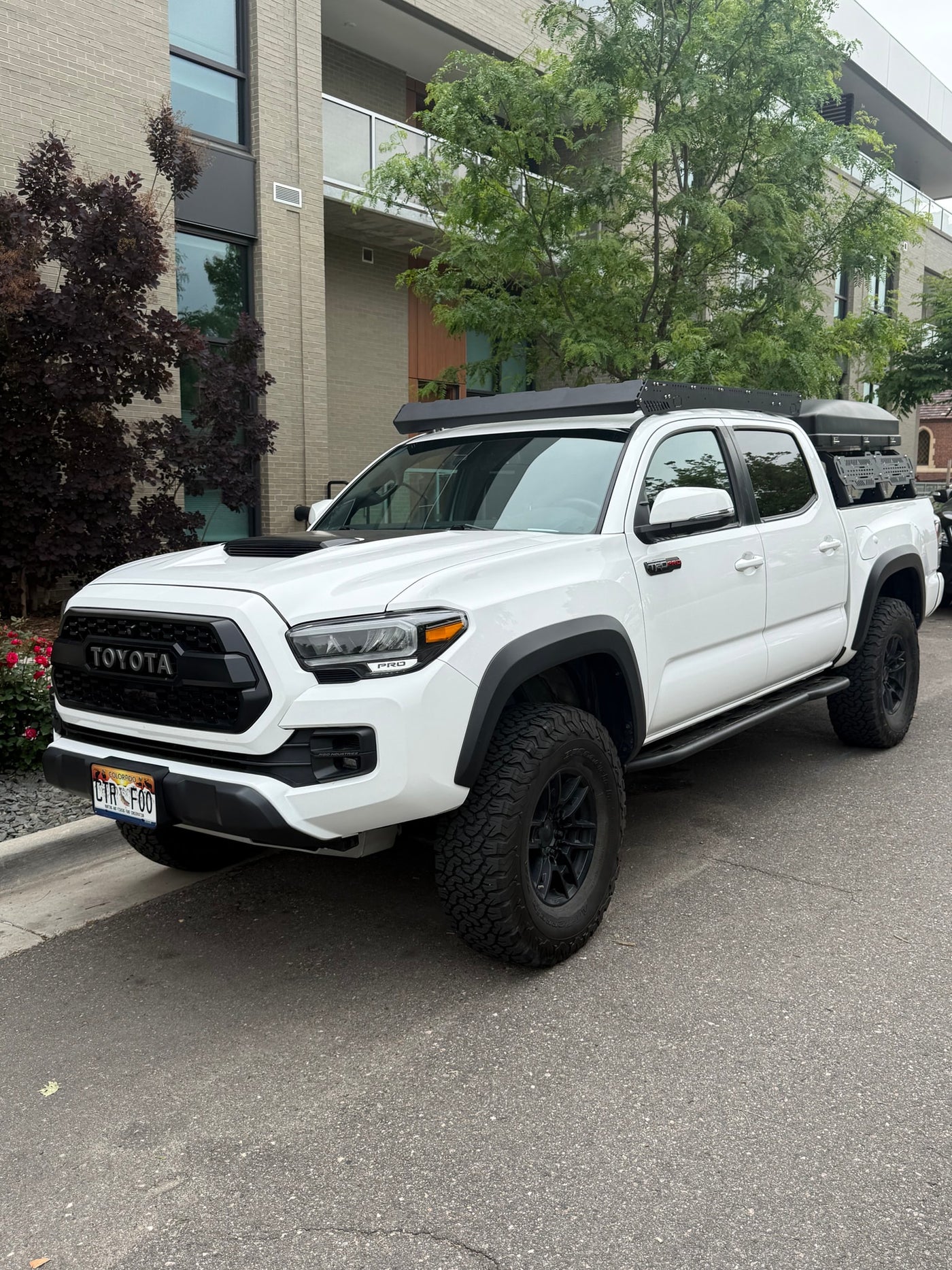 White Toyota Tacoma TRD Pro pickup truck, outfitted for camping/overlanding. Perfect for an adventure rv rental. — photo 14