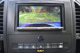 RV rental interior: Dashboard with Sony backup camera showing surroundings and safety lines, plus vehicle controls.
