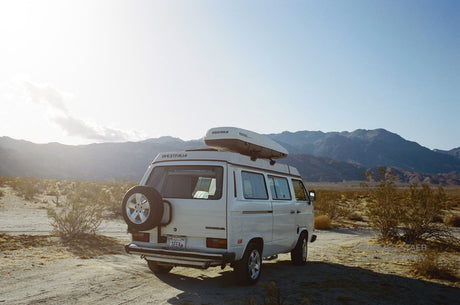 White Westfalia camper van with roof cargo box