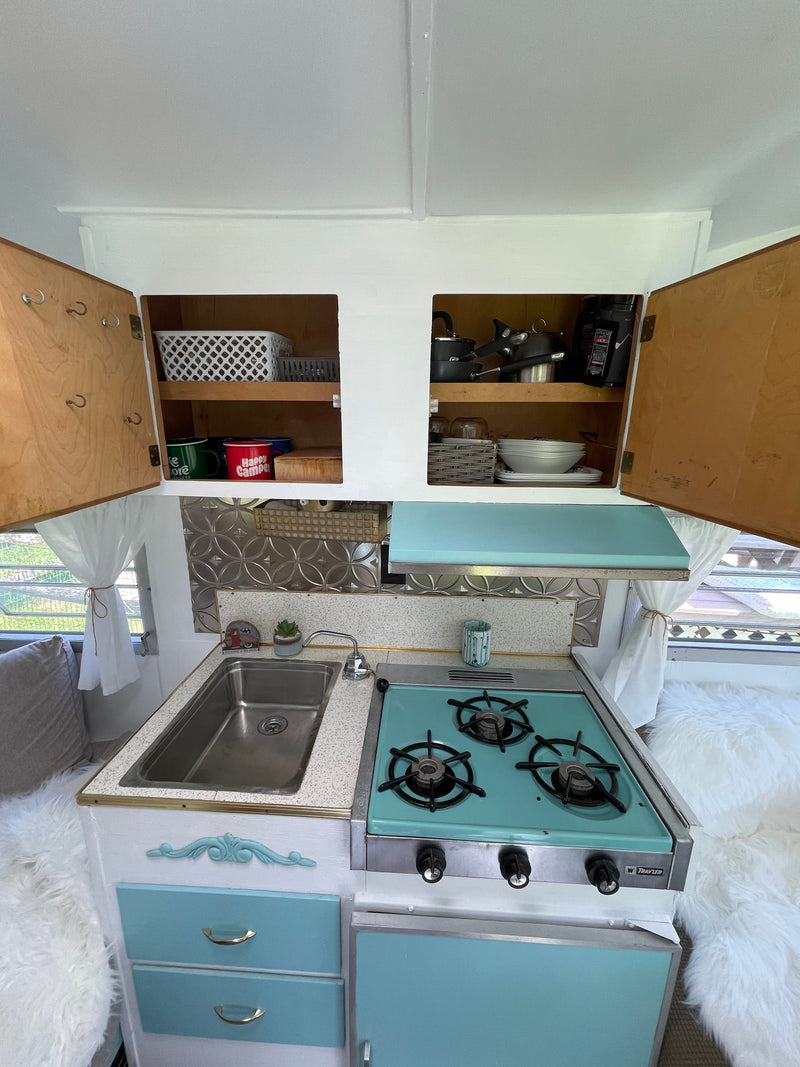  complete with a stove and sink — photo 12