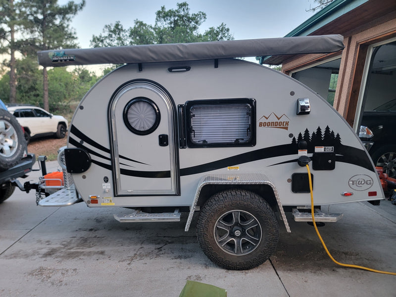 A gray T@G Boondock teardrop RV rental with an Ironman 4x4 awning — photo 1