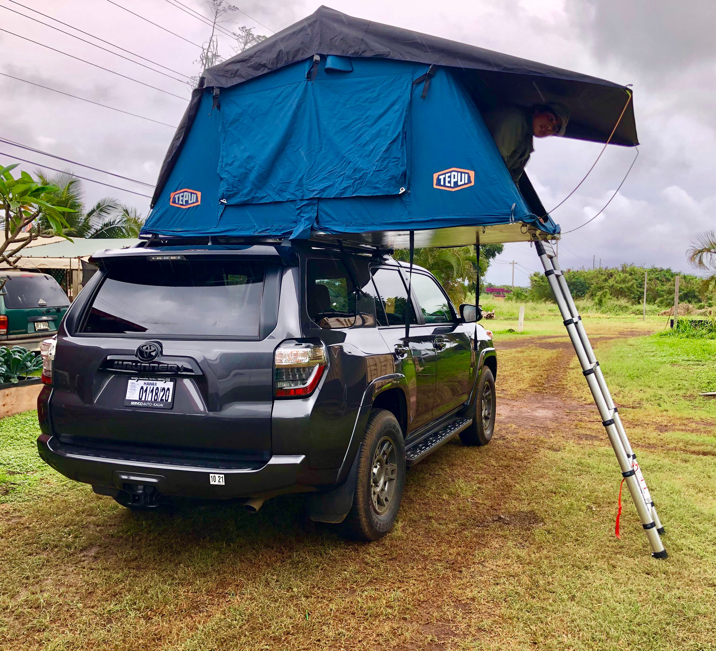 Dark gray Toyota 4Runner with Tepui rooftop tent, offering an RV rental alternative for camping adventures. — photo 14