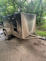 Muddy off-road trailer after an adventure; perfect for your next RV rental camping trip.