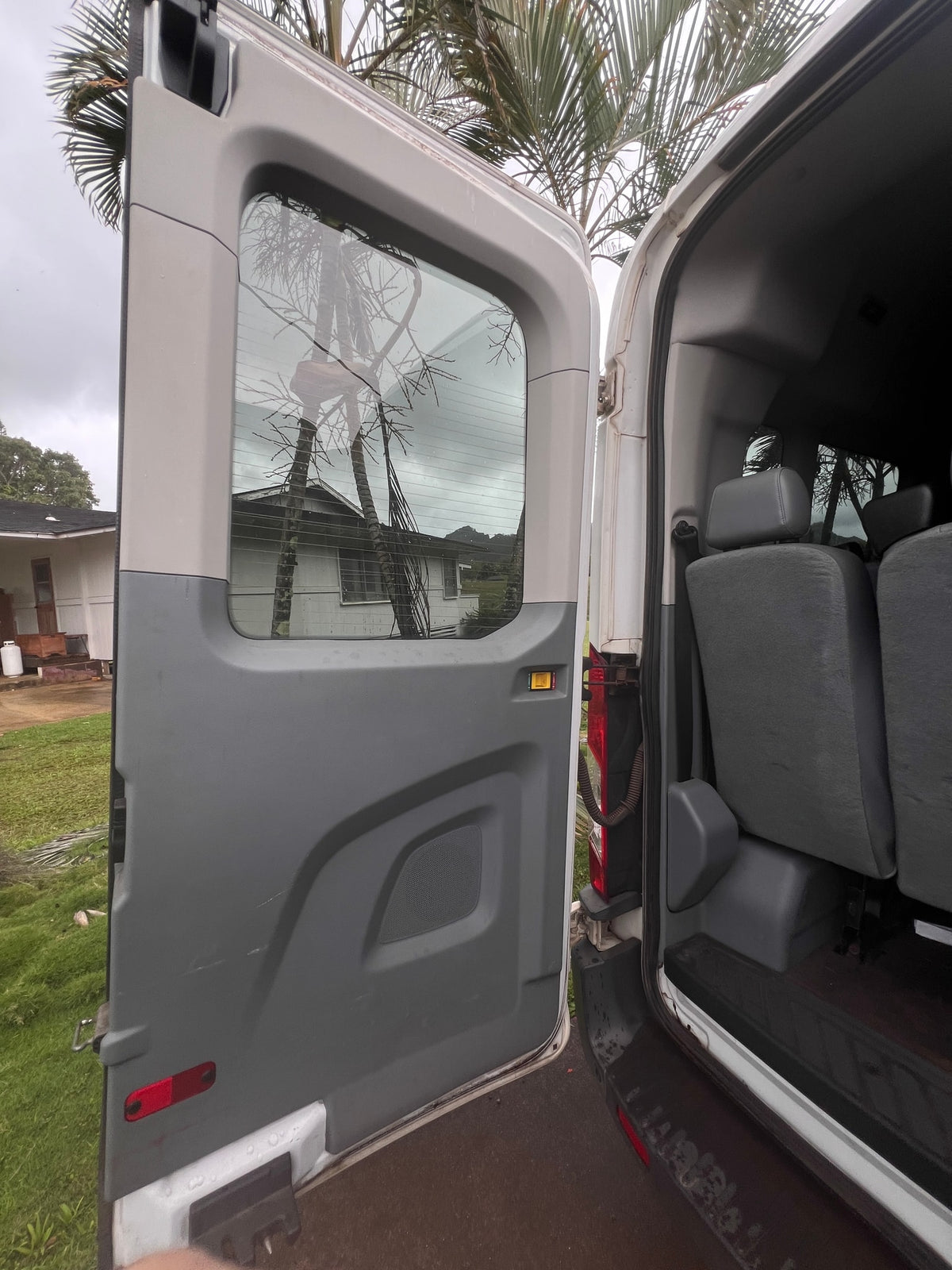  and wide entry step visible through the open sliding door.|RV rental interior: A bright — photo 18
