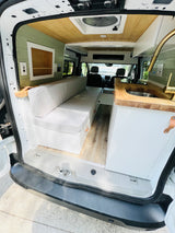 Step inside this beautifully converted campervan! Ideal for your next RV rental adventure, featuring a full kitchen & cozy seating area.