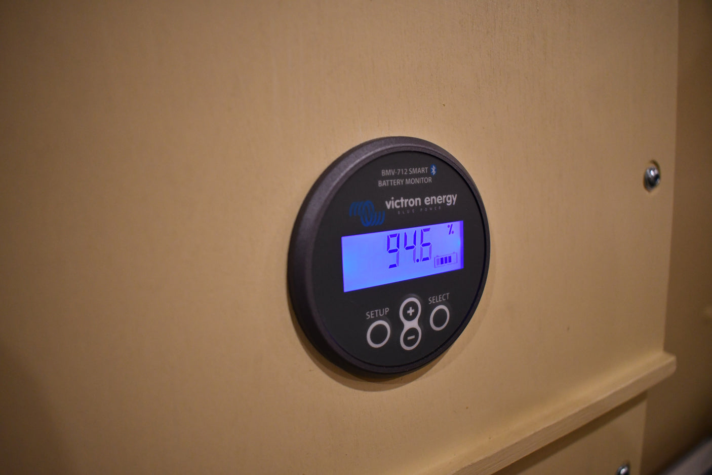 RV rental's Victron BMV-712 Smart Battery Monitor displays 94.6% charge, crucial for monitoring onboard power.
