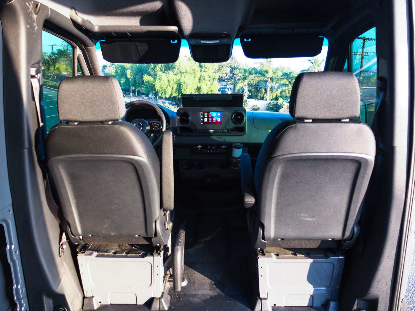  and smart storage for mobile living.|Cozy RV rental interior with ocean views from the back — photo 9
