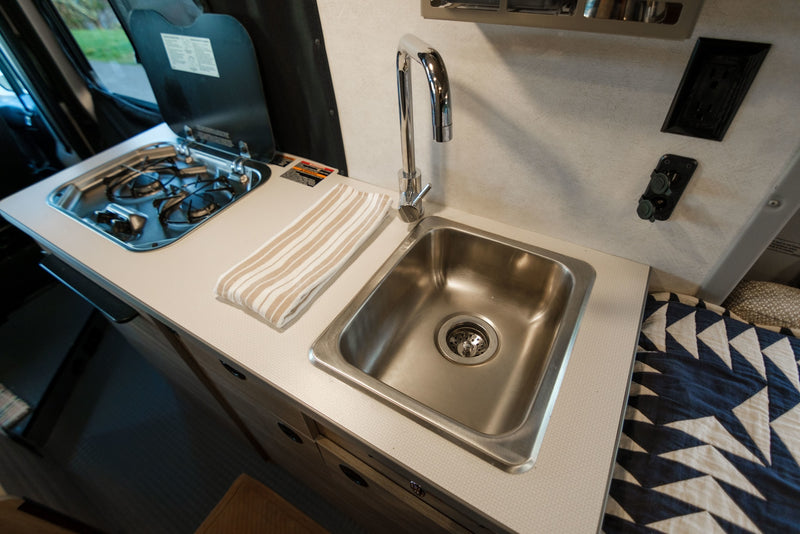  visible from the front seats.|Inside an RV rental: front cabin with comfortable seats — photo 14