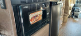  and modern kitchen counter. Perfect for road trips.|RV rental interior: Winnebago smart control panel