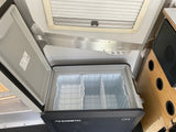 RV rental interior with an open Dometic CFX portable fridge/freezer, ready for your food storage needs.