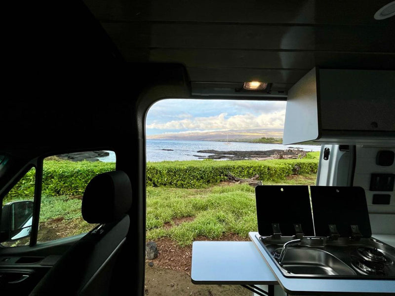  ready for travel adventures.|Cozy RV rental interior with a comfortable bed — photo 9