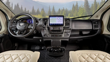 Inside your RV rental: a modern, spacious dashboard with advanced navigation & plush seating for journeys.