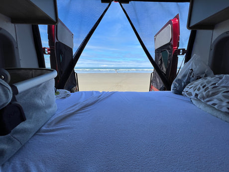RV rental: Wake up to ocean views from your comfortable camper bed. Perfect beach travel.