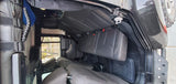 Inside an **RV rental** SUV: black seats, versatile cargo space, and rugged floor mats. Ready for any trip.