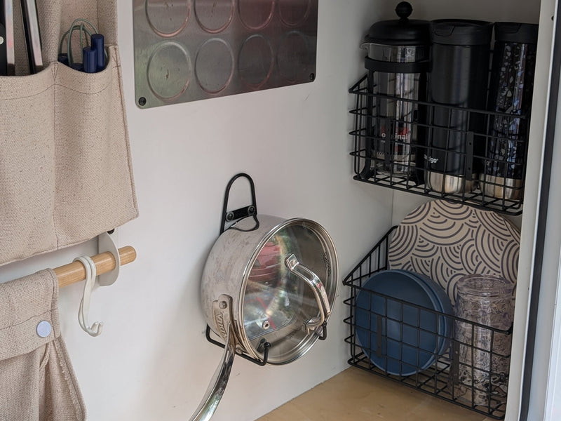  and accent lighting.|Cozy compact bed in an RV rental with white pillows — photo 7