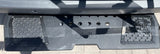 Rear step on an RV rental, enhancing access. Features 'OWL' branding, hexagonal grip, and gear attachment points.
