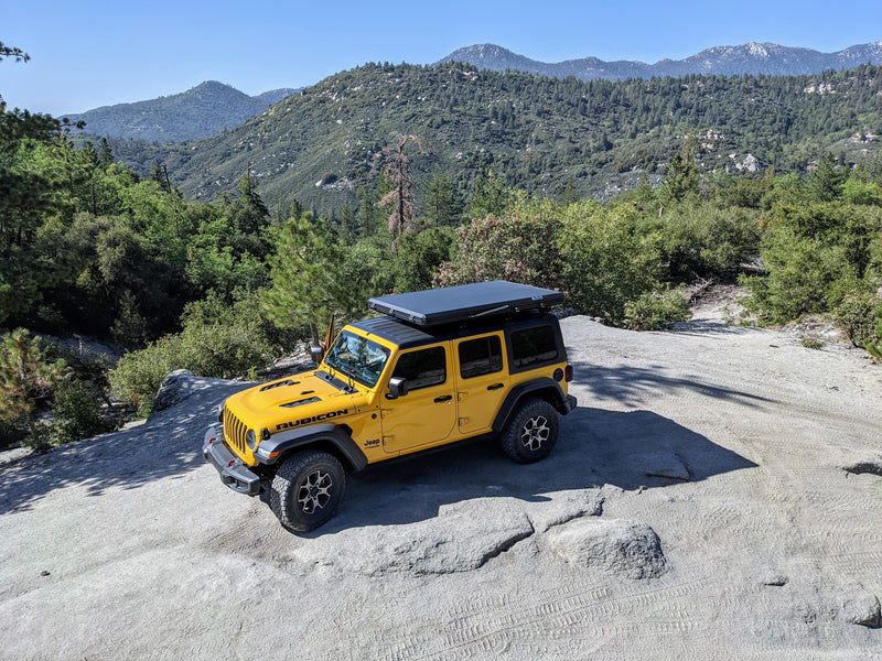  ideal for overland camping adventures. A unique rv rental alternative.|Explore vast deserts in a yellow Jeep with a rooftop tent — photo 15