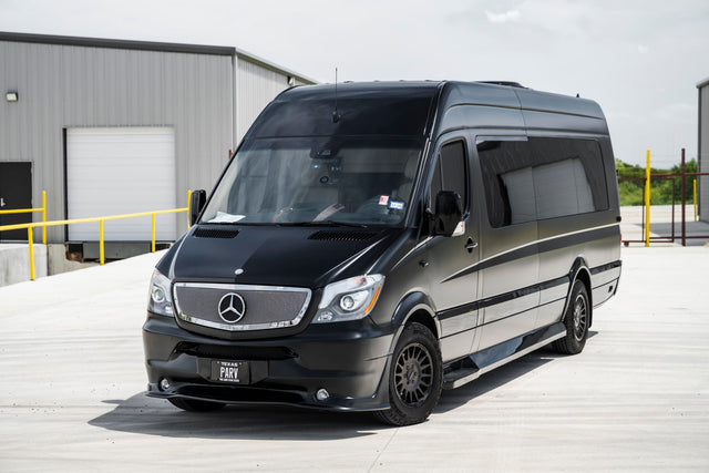 A sleek black Mercedes-Benz Sprinter van