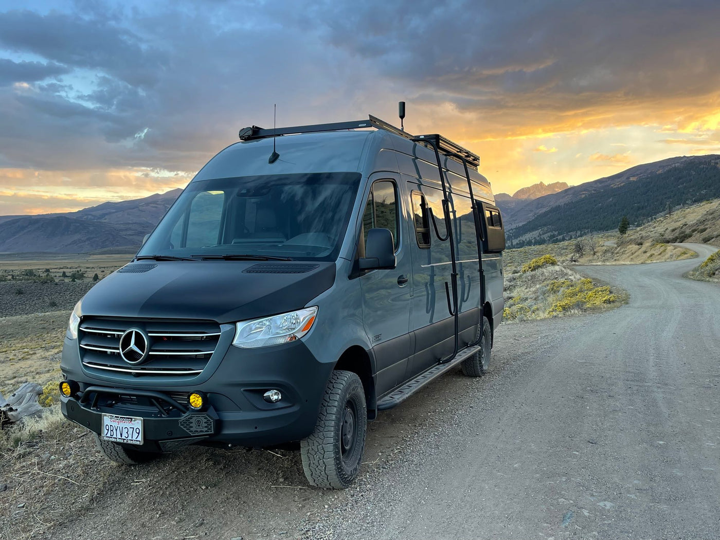  brilliantly reflected on an RV rental side. Ideal for scenic drives.|Rugged Mercedes Sprinter camper van — photo 2