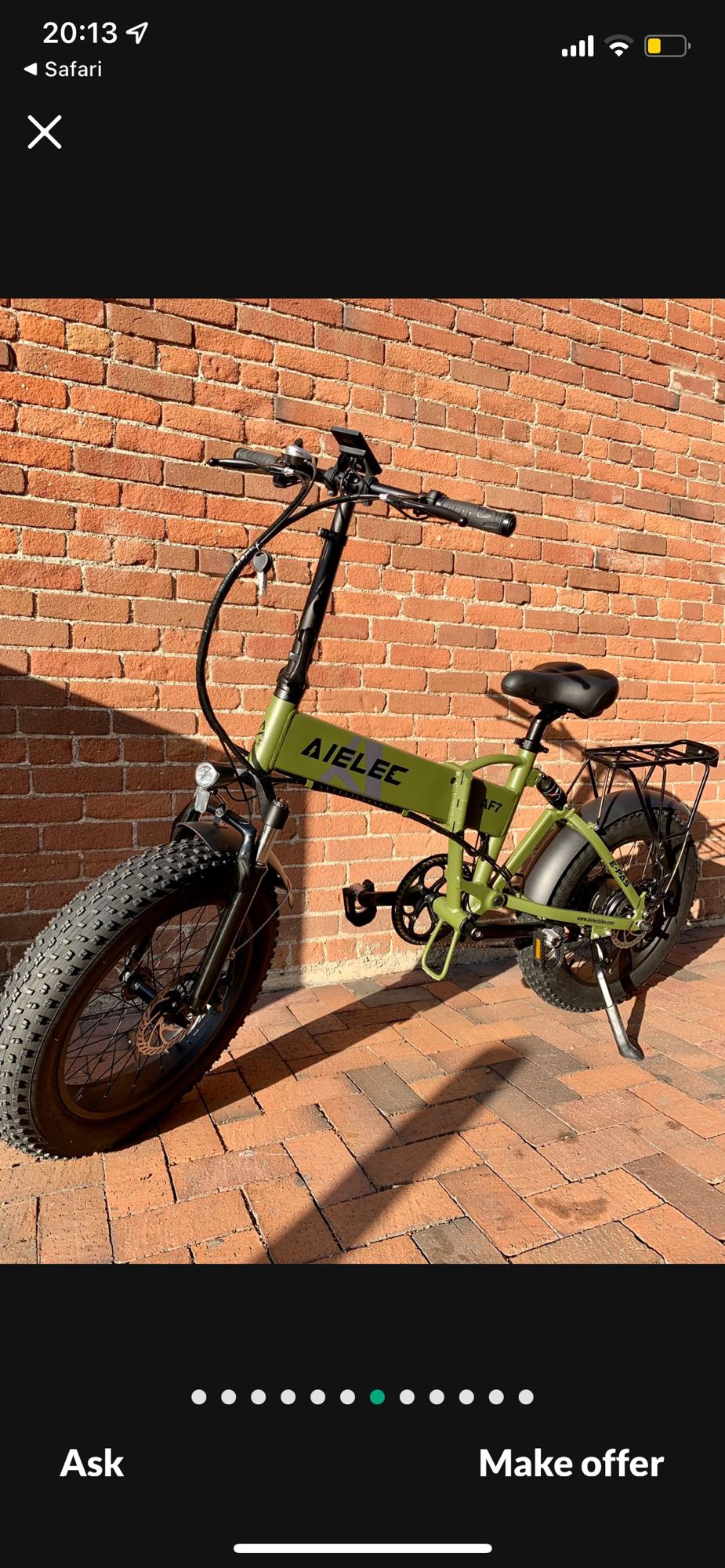 Green AIELEC folding e-bike, perfect for an rv rental adventure.