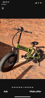 Green AIELEC folding e-bike, perfect for an rv rental adventure.