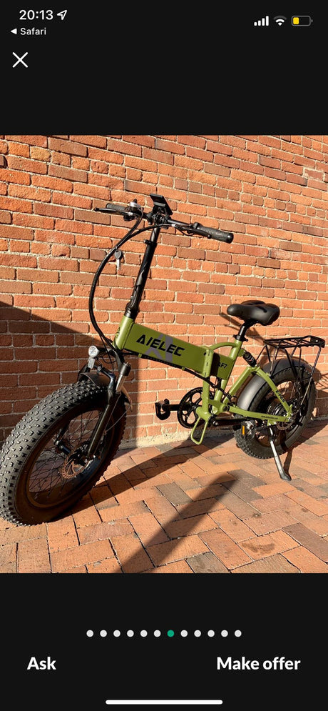 Green AIELEC folding e-bike, perfect for an rv rental adventure.