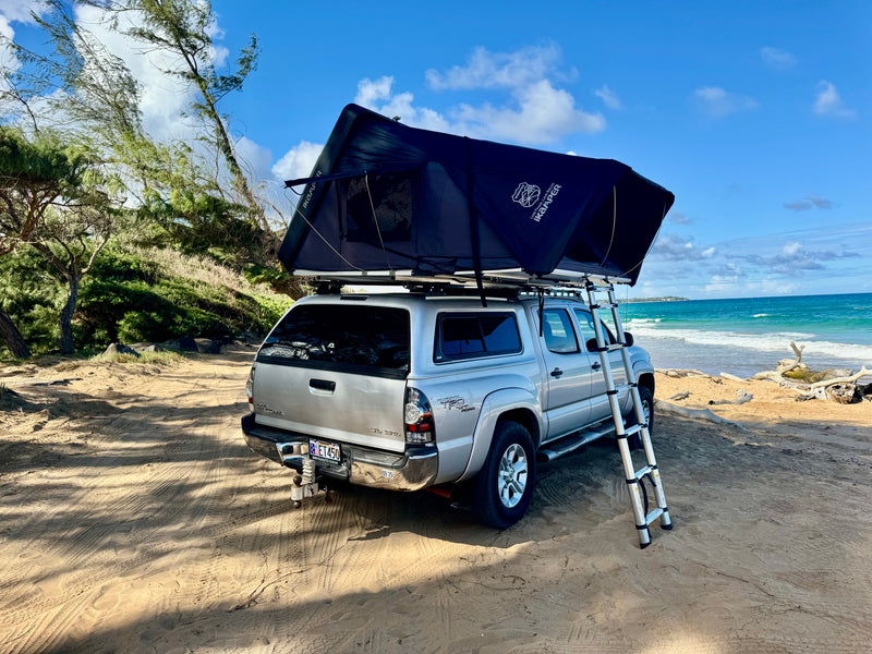 Explore the coast! An RV rental, a pickup with an iKamper roof-top tent, parked for beach camping by the beautiful ocean. — photo 1