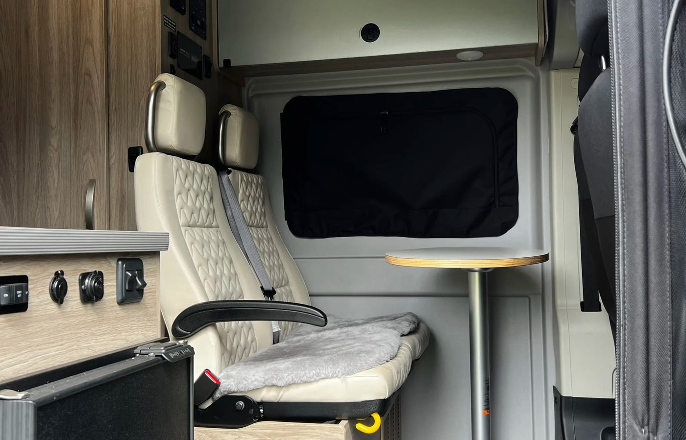  and versatile dining space.|Inside an RV rental van — photo 8