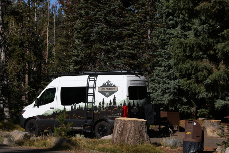 High Country RV rental camper van at a forest campsite. Ready for outdoor adventure and nature exploration. — photo 8