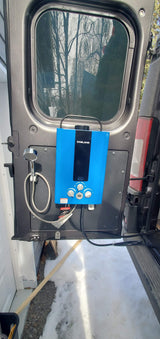 RV rental: Portable Gasland hot water heater and shower setup installed on a van's rear door for outdoor use.