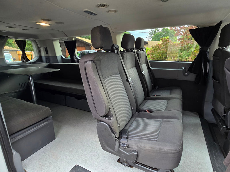  showing multiple rows of cloth seats — photo 17
