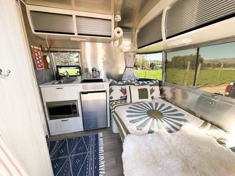 Moonshine: Retro-Coastal 16’ Airstream (Concierge Delivery)