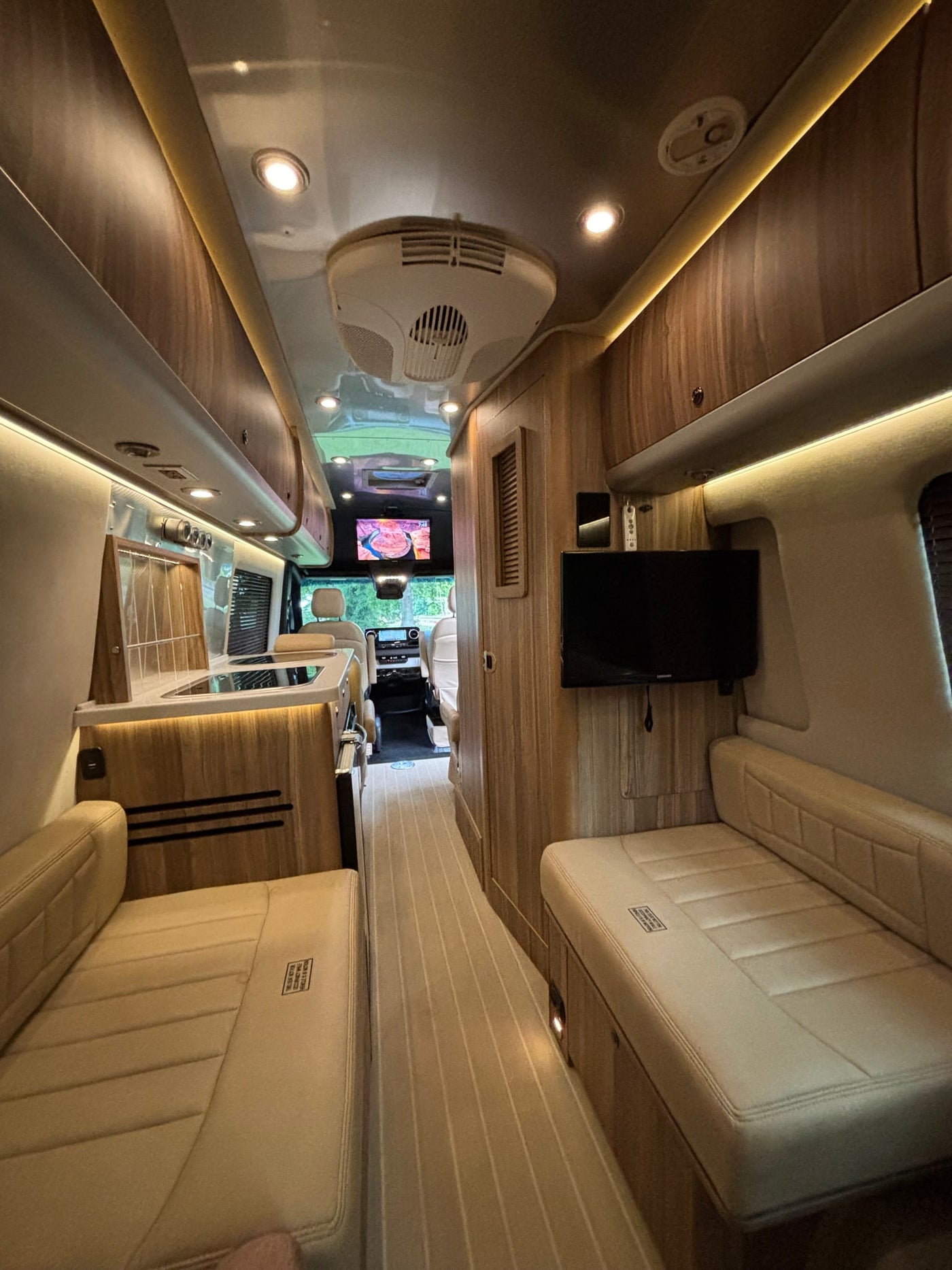  featuring its dashboard & steering wheel.|Spacious Mercedes-Benz Sprinter van interior — photo 17