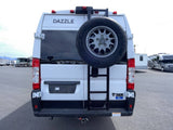 Rear view of a white Thor Dazzle RV rental van. It features a spare tire and ladder on the back door.