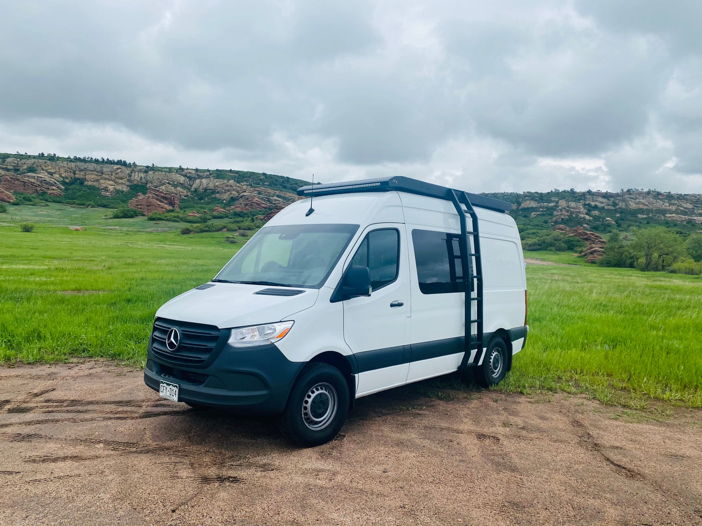 Explore Colorado with this white Mercedes Sprinter camper van, ideal for your next rv rental adventure. — photo 9