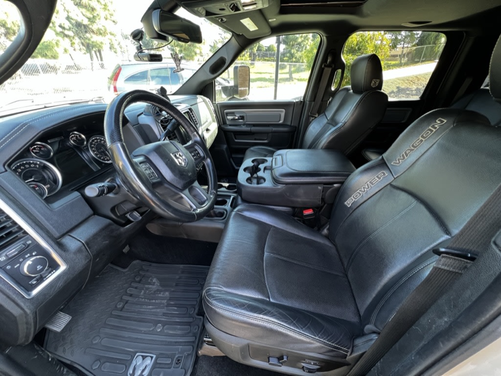  fitted with a black bed rack and rooftop tent. Perfect for overland camping adventures — photo 5