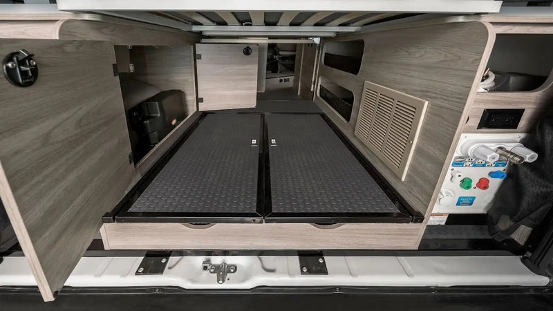  and flexible seating.|This rv rental offers a versatile camper van interior with a cozy bed — photo 16