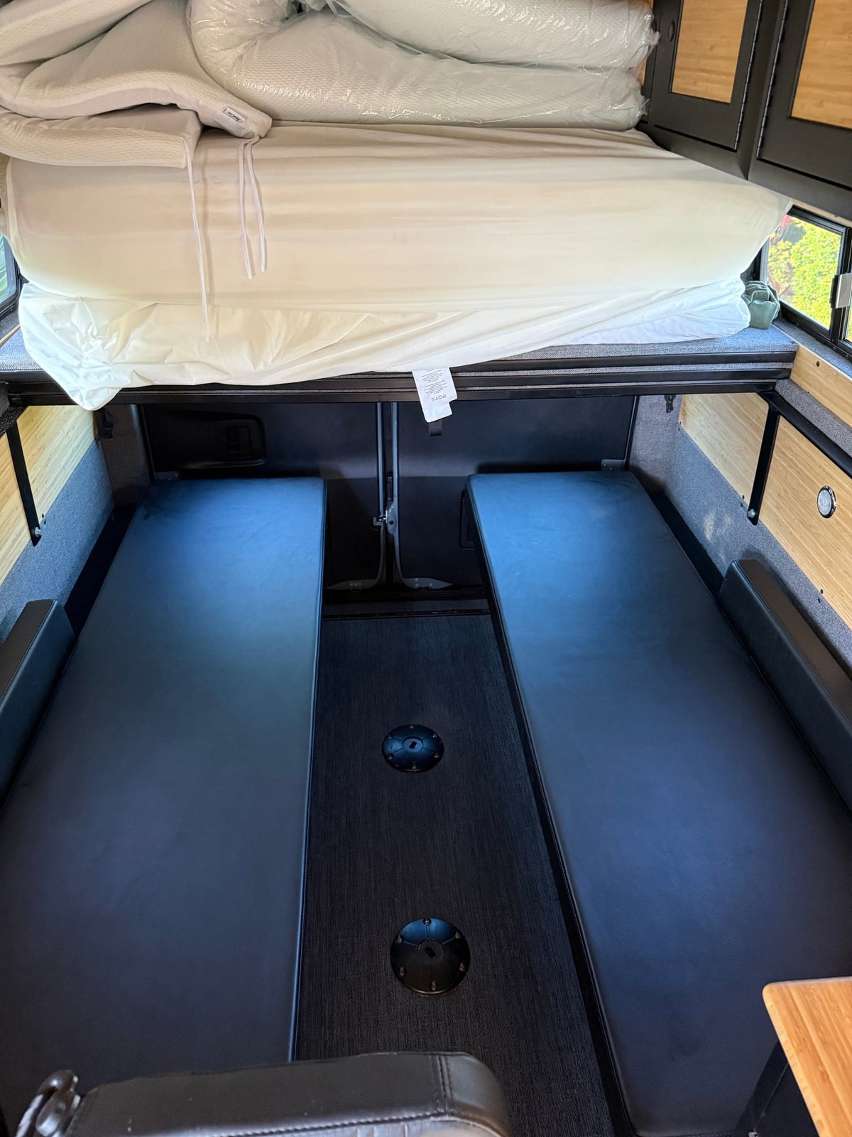  and infotainment system.|Inside a cozy RV rental van — photo 9