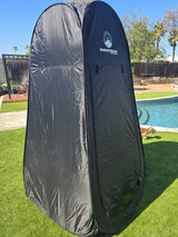 Black portable Wakeman Outdoors privacy tent, ideal for RV rental, camping, or poolside changing/showering.